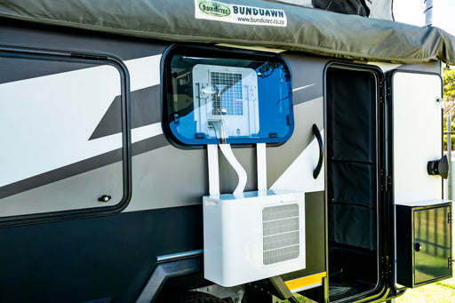 Solenco Caravan Air Conditioner fitted in the window of a Stealth caravan (outside view)