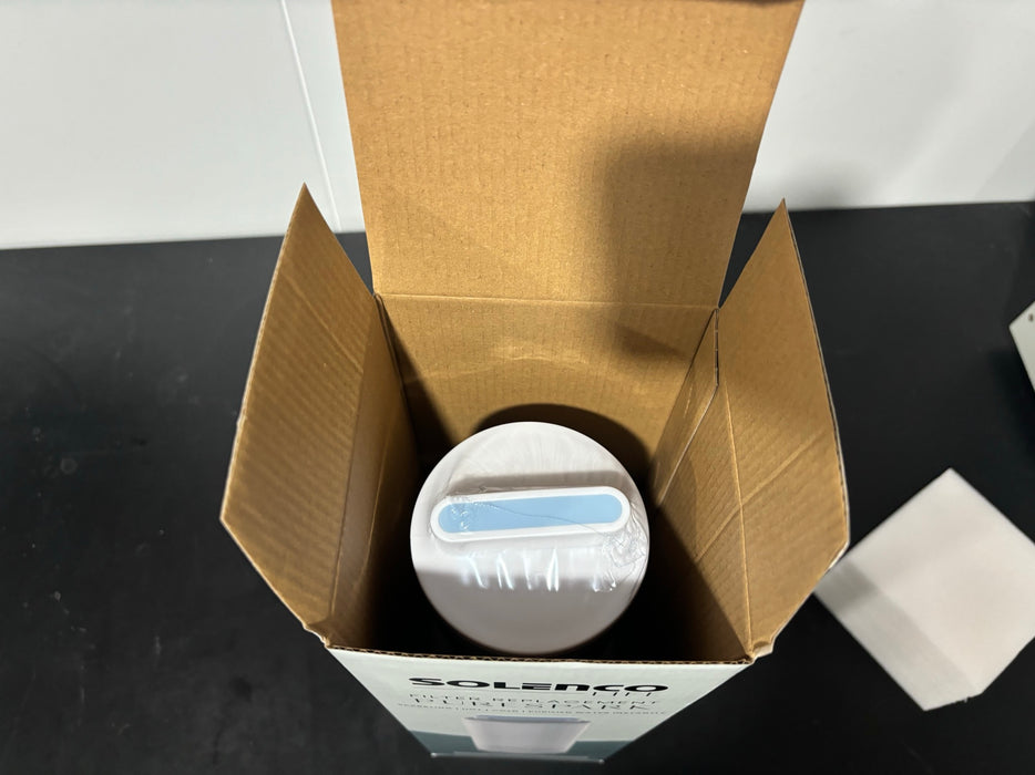PureSpark filter cartridge seated in its box